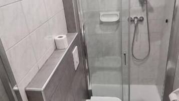 Classic Double Room | Bathroom | Shower, hair dryer, towels, soap