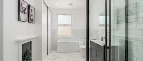 Shower, hair dryer, towels