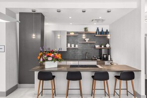 Fridge, microwave, oven, stovetop - Downtown Stamford Luxury | Indoor Pool & Gym (Stamford, CT)