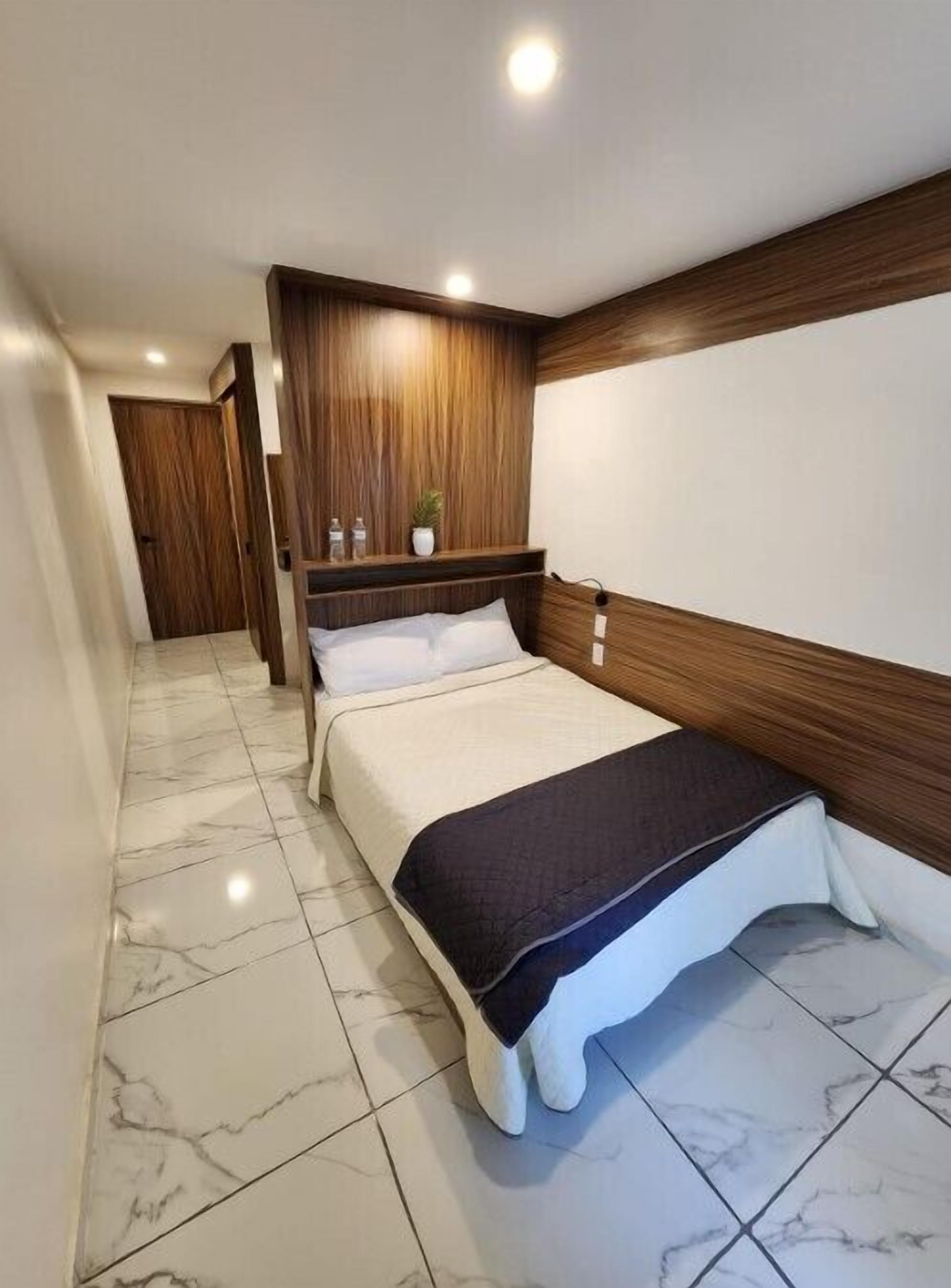 Kamar Standar, pemandangan halaman | Seprai premium, setrika/meja setrika, Wi-Fi gratis, dan seprai linen