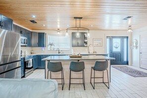 Fridge, microwave, oven, stovetop - Pet-friendly Beach House: steps to the beach w/heated pool, firepit, fenced yard (Panama City Beach)