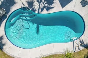 A heated pool - Pet-friendly Beach House: steps to the beach w/heated pool, firepit, fenced yard (Panama City Beach)
