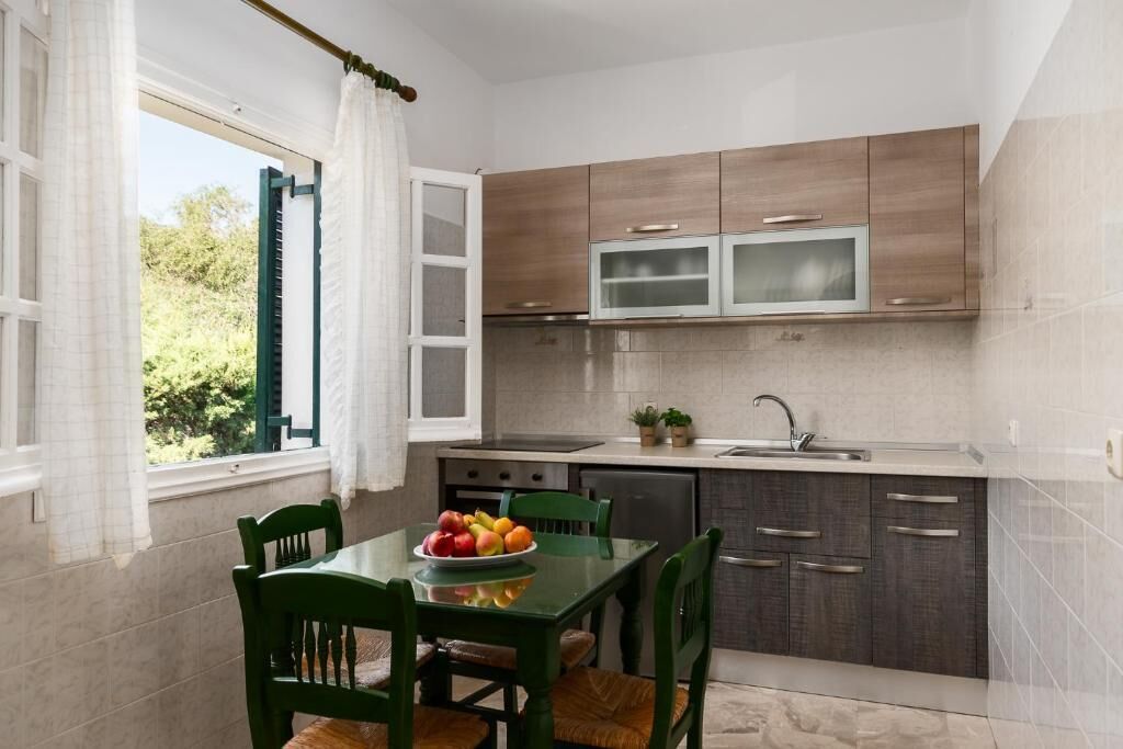 Apartamento, sacada, vista para o mar | Cozinha privada