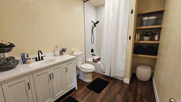 Hair dryer, towels, soap, toilet paper
