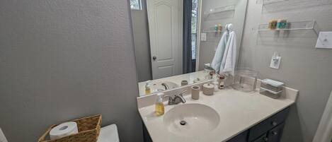 Hair dryer, towels, soap, toilet paper