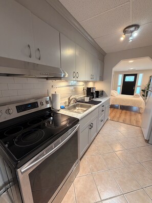 Fridge, microwave, oven, stovetop - Pet-Friendly 1BR Apartment with/Laundry- Walk to Shops and Downtown (Stamford)