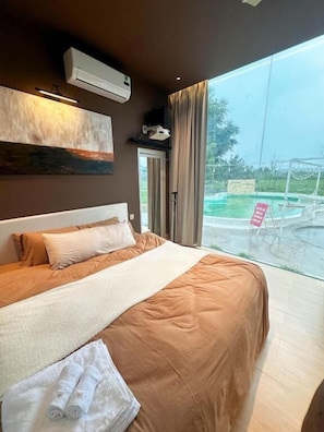 Habitación doble Deluxe, vista al río | Insonorización, tabla de planchar con plancha y wifi gratis