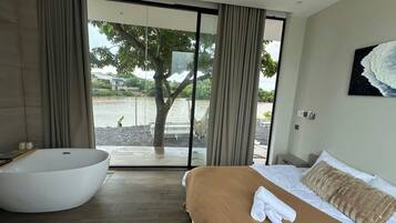 Chambre Double Deluxe, bain à remous, vue fleuve