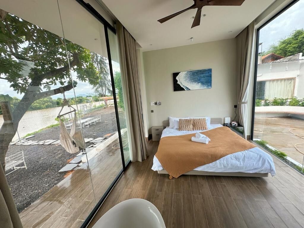 Habitación doble Deluxe, vista al río | Insonorización, tabla de planchar con plancha y wifi gratis 