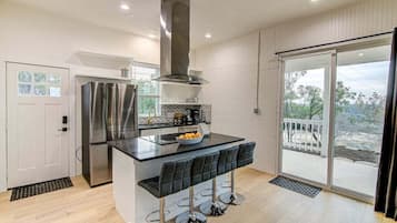 House, 2 Queen Beds, Hot Tub (Eagle's Nest) | Private kitchen | Dining tables