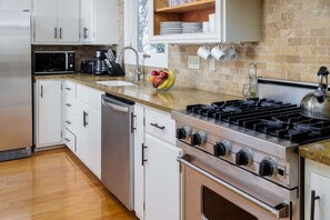 House, Multiple Beds, Hot Tub, Garden View (Das Treff Platz | Hot Tub | Firepit) | Private kitchen | Dining tables - Das Treff Platz- The Gathering Place - Hot Tub! (Fredericksburg)