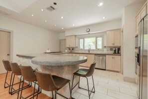 House, Multiple Beds, Pool Access, Garden View (Triple 3 Ranch | Pool, Tennis & ) | Private kitchen | Dining tables - Triple 3 Ranch Pool, Tennis & Pickleball Retreat (Dripping Springs)