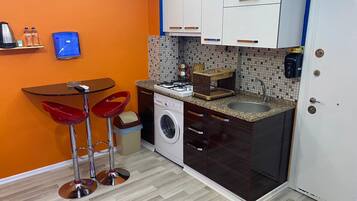Deluxe Apartment, Balcony | Private kitchen