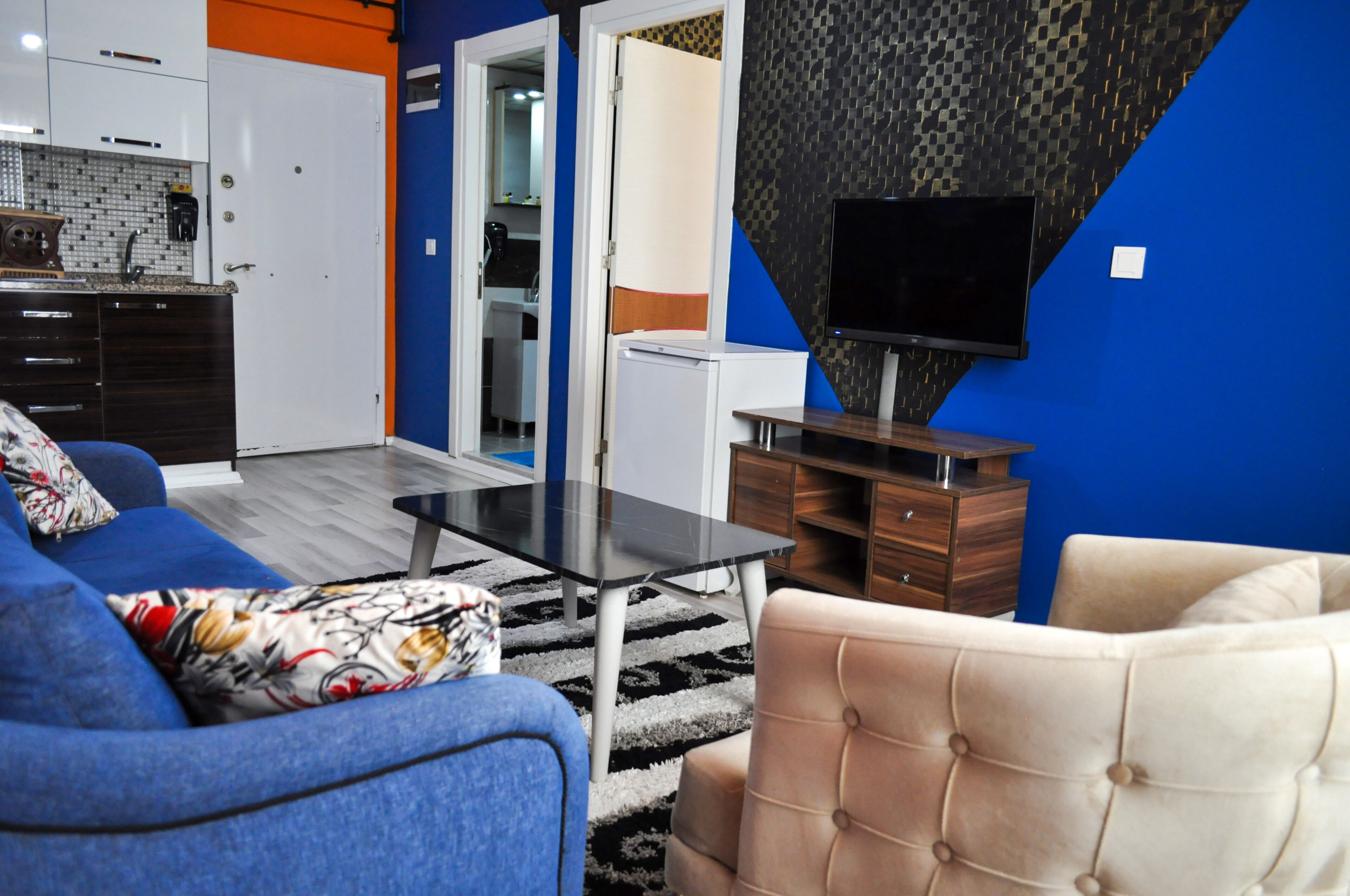 Apartamento Deluxe, balcón | Zona de estar