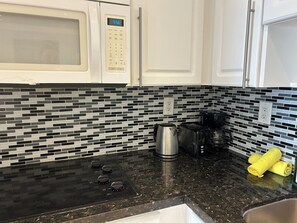 Fridge, microwave, oven, stovetop - Stylish beachside 1-bedroom apartment in Sunny Isles Beach (Sunny Isles Beach)
