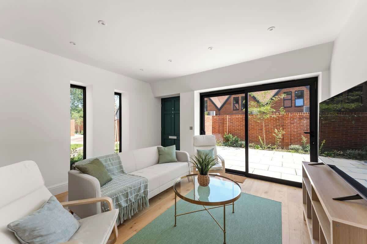 Bright modern living room with garden views and natural light