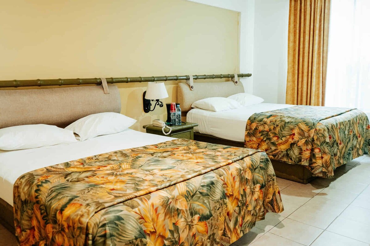 Standard Room, 2 Double Beds, Air conditioning, Garden Area | Blackout curtains, iron/ironing board, free WiFi, bed sheets