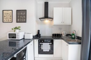 Fridge, microwave, oven, stovetop - Central 2 Bedroom House-Parking- by ViVi Stays (County Durham)