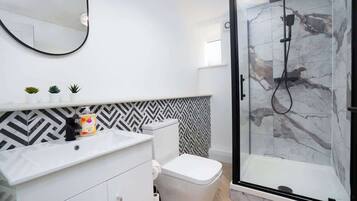 Shower, hair dryer, shampoo