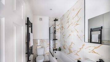 Shower, hair dryer, shampoo