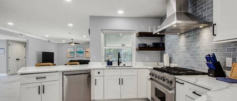 Coffee/tea maker, fridge, microwave, oven