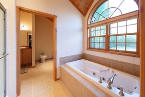 Shower, jetted bath, towels