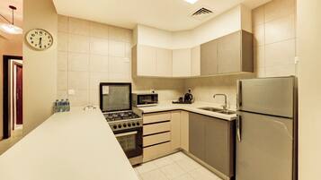Luxury Apartment, Balcony, Mountain View | Private kitchen | Fridge, coffee/tea maker, cookware/dishes/utensils