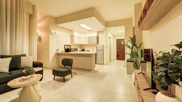 Luxury Apartment, Balcony, Mountain View | Living area | 43-inch Smart TV with satellite channels