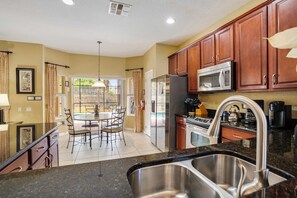 Fridge, microwave, oven, stovetop - 6BR family retreat near Disney w/ pool & hot tub (Kissimmee)