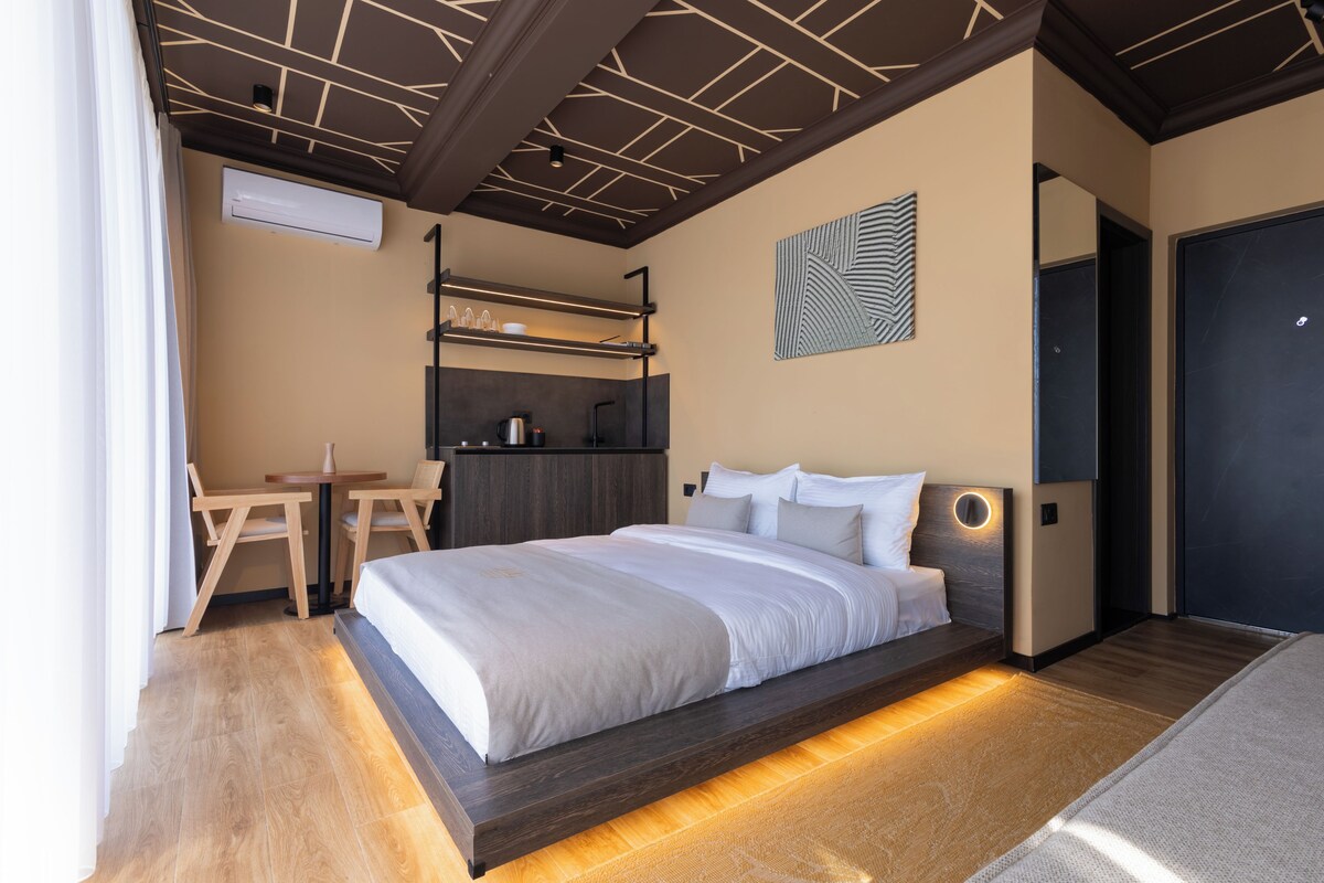 Habitación Deluxe, vistas a la ciudad | Escritorio, espacio para trabajar con un portátil, cortinas opacas