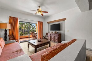 Luxury Apartment | Living area | 60-inch LED TV with cable channels - Velas Resort Access Beachfront 3BR Condo (Puerto Vallarta)