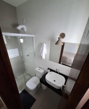 Shower, towels, soap, toilet paper