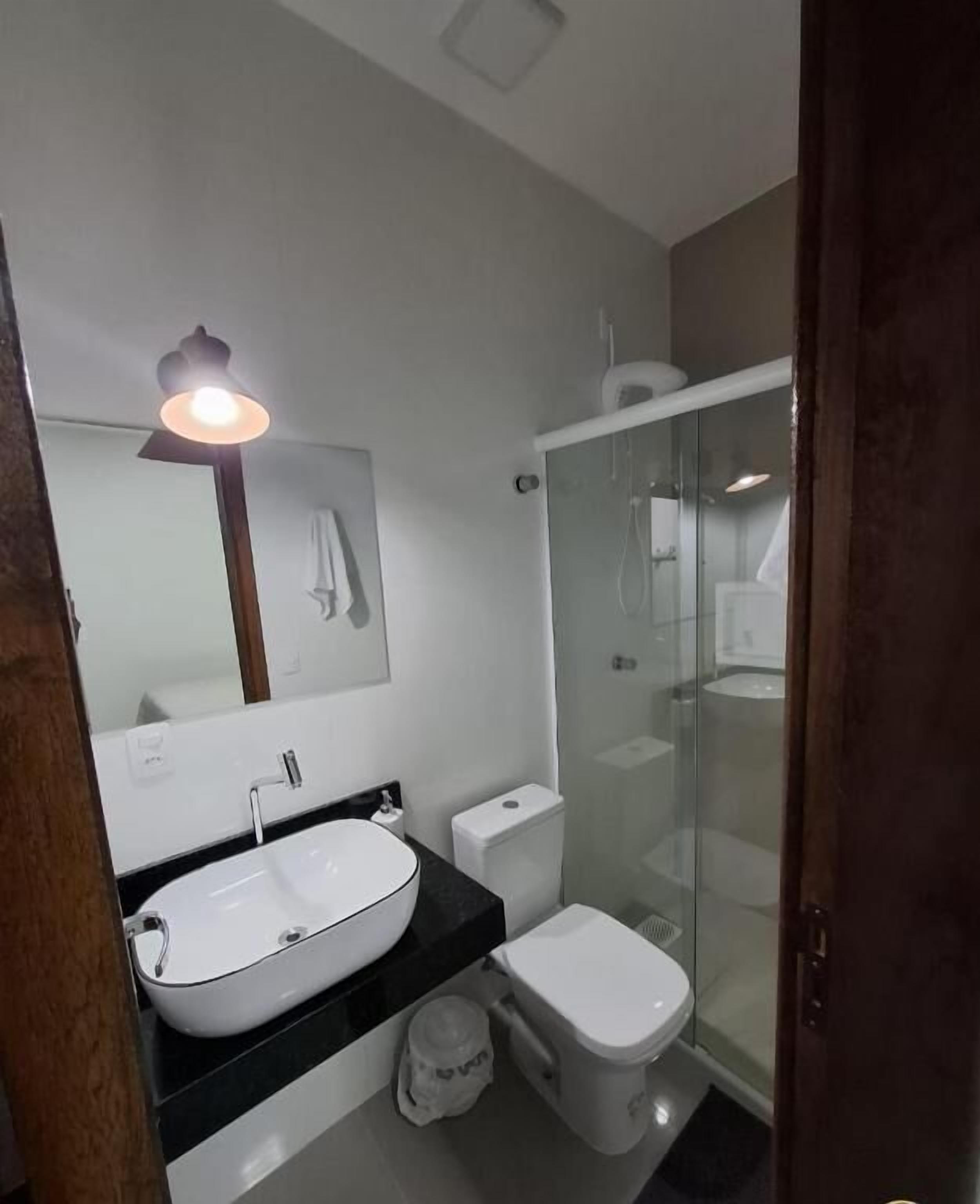 Shower, towels, soap, toilet paper