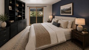 A bedroom with a bed, nightstands, a dresser, a window, and a painting on the wall. - Sky Loft: Steps to skiing w/ hot tub! (Telluride)