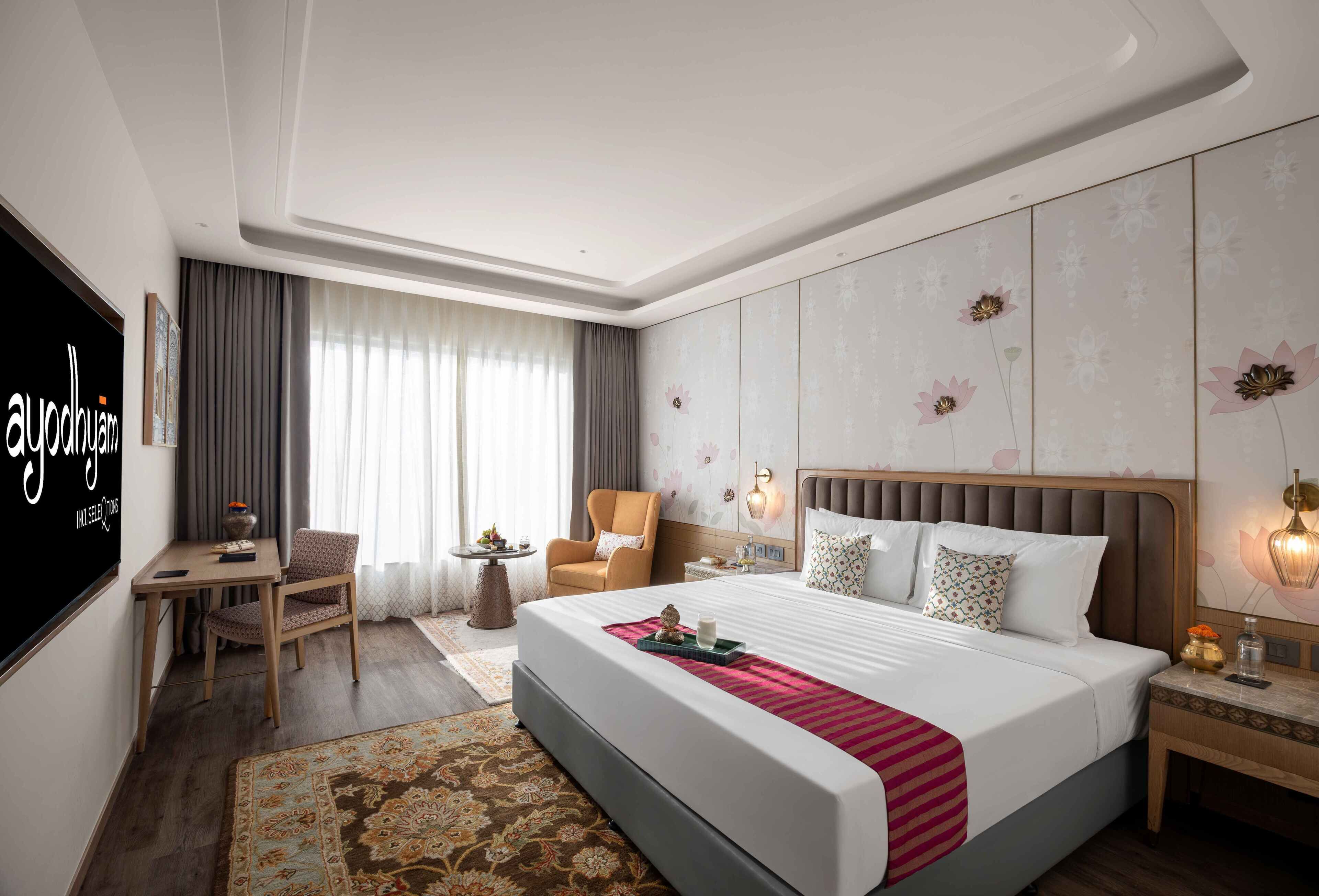 Habitación Deluxe, 1 cama King size | Ropa de cama de alta calidad y caja de seguridad en la habitación 