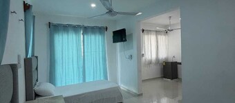 Room with double bed + single bed in Xul-Ha
