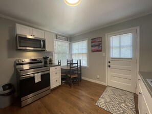 Fridge, microwave, oven, stovetop - Quaint 2 bedroom 1 Bath home located in Downtown Winston Salem near hospitals and convention Center (Winston-Salem)