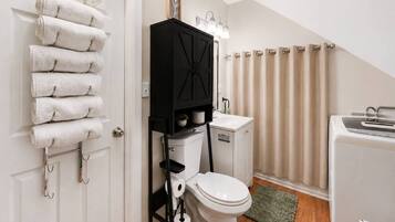 Hair dryer, towels, soap, shampoo