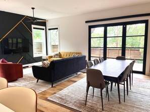 Bright modern living & dining area with designer style and natural light - South Austin Luxury: SoCo, S. 1st + Cowboy Pool (Austin)