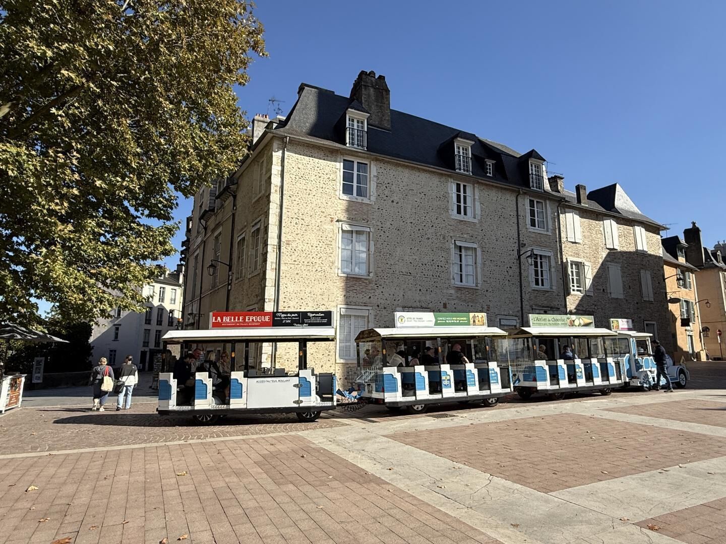A historic building with a restaurant named 'LA BELLE EPOQUE' on the ground floor.