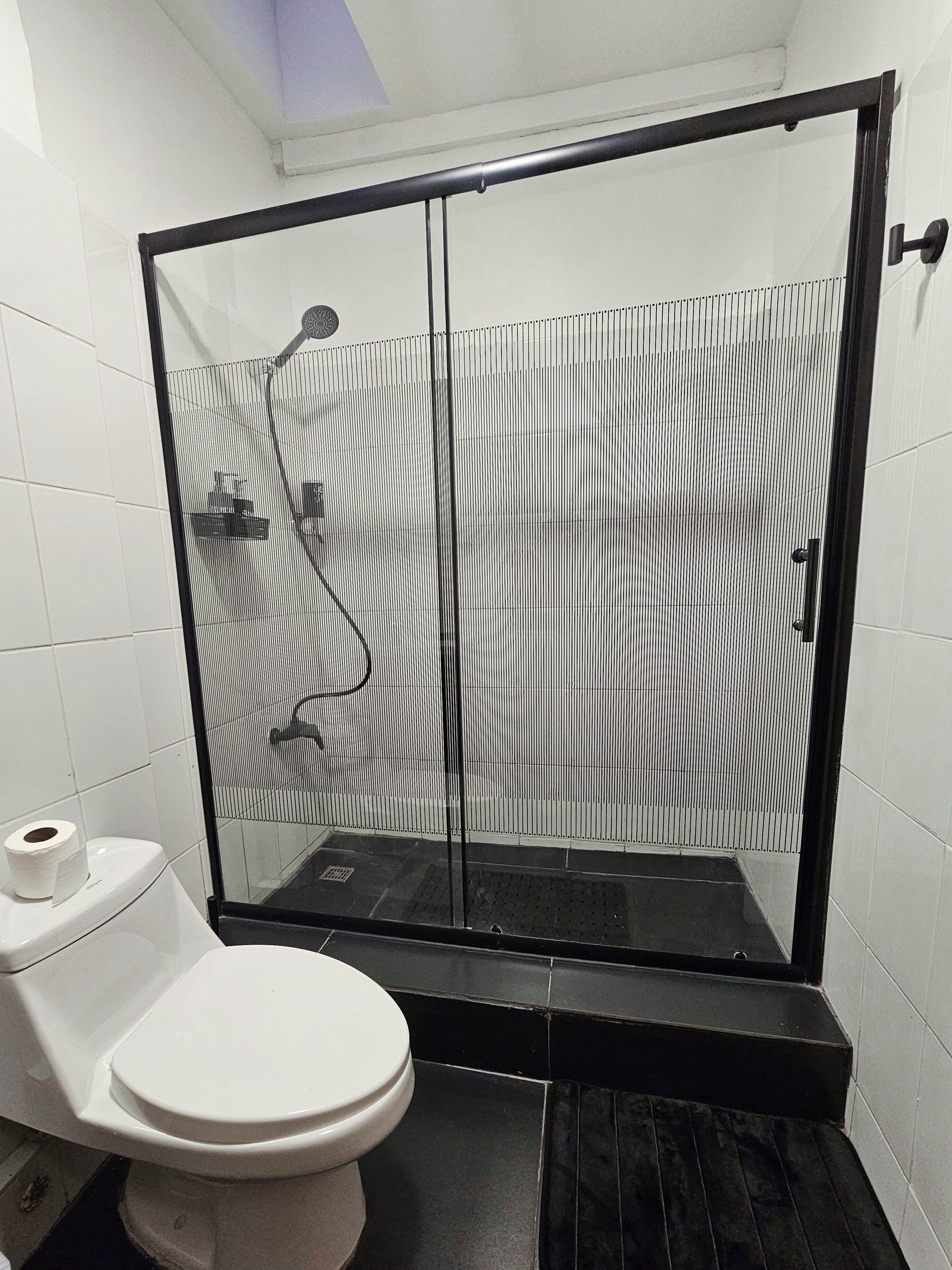 Comfort Suite, Patio | Bathroom | Shower, towels, soap, shampoo