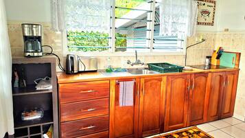 Fridge, stovetop, coffee/tea maker, electric kettle