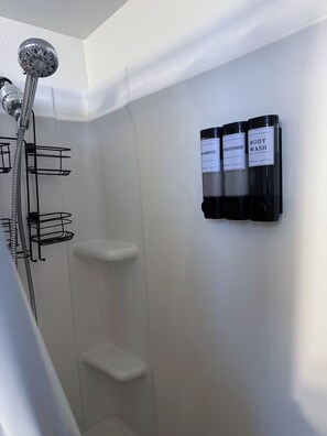 Hair dryer, towels, soap, toilet paper