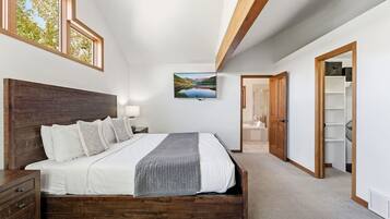 Tabla de planchar con plancha, wifi y ropa de cama