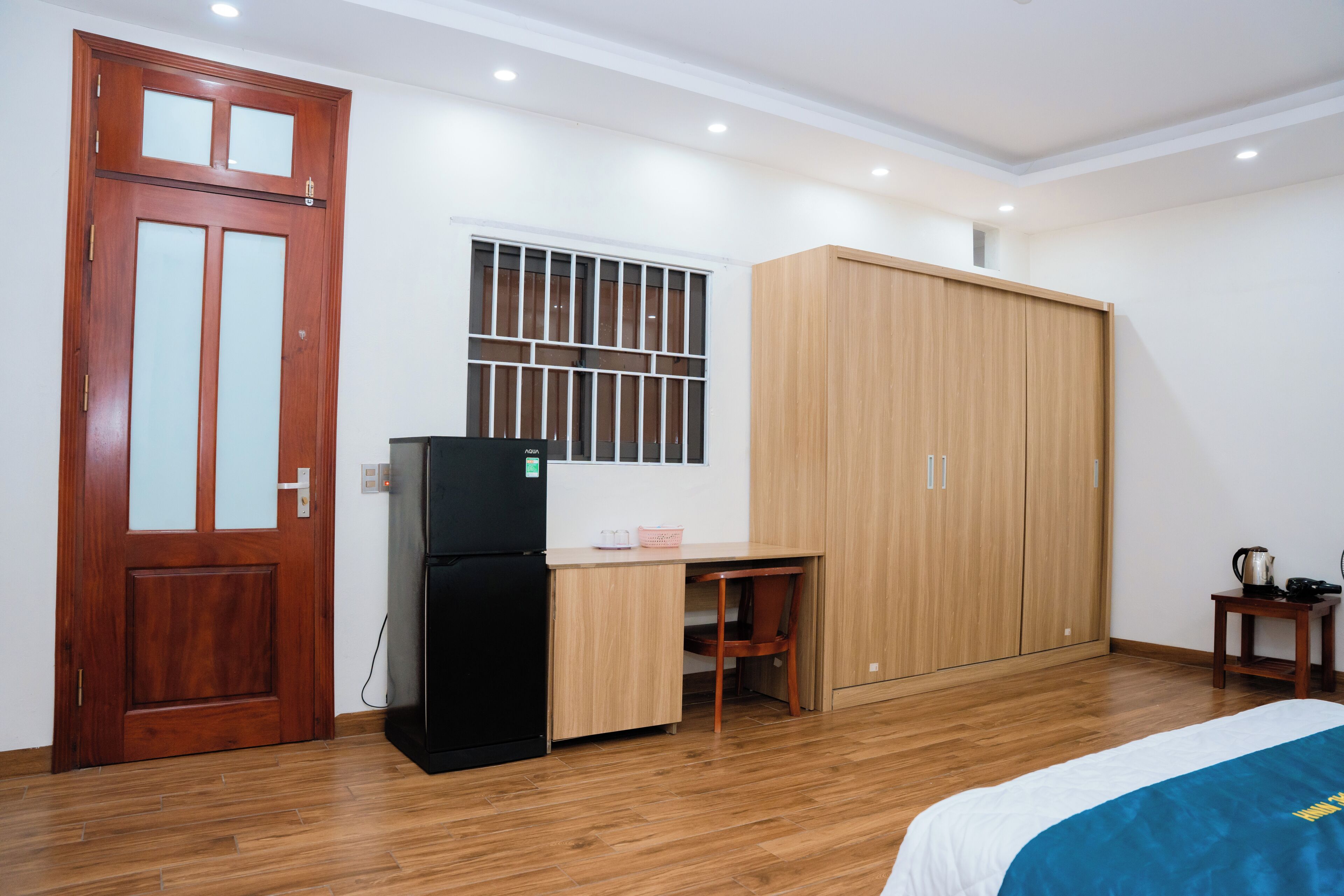 Deluxe Room, Multiple Beds, Balcony, City View | Desk, laptop workspace, free WiFi