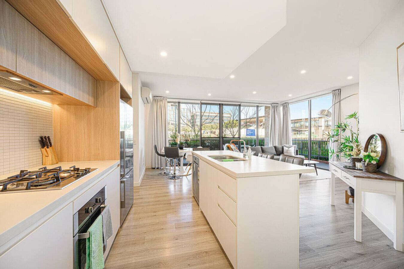 Fridge, oven, toaster, dining tables