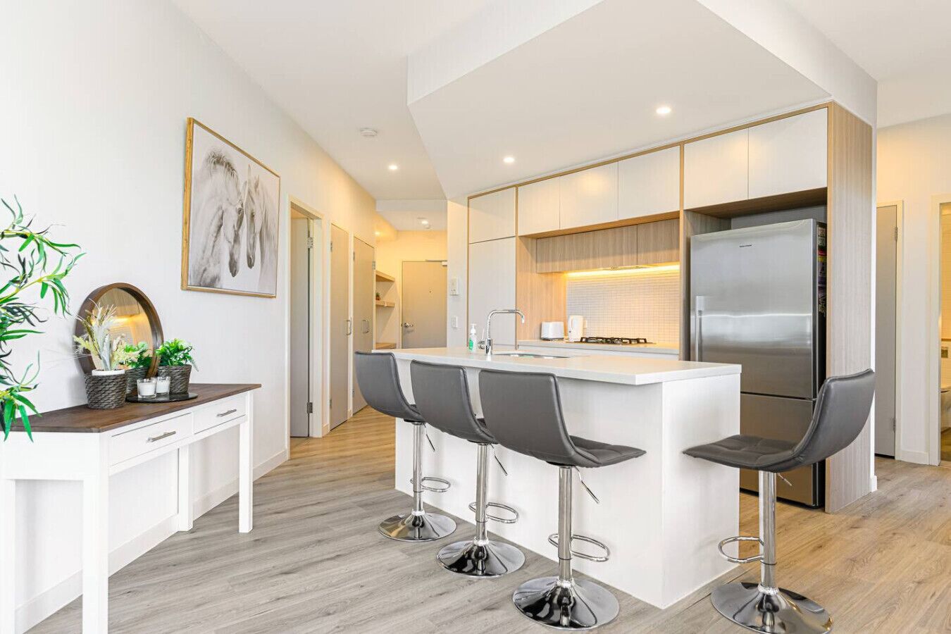 Fridge, oven, toaster, dining tables