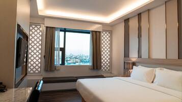 Habitación doble Deluxe | Escritorio, wifi gratis y ropa de cama