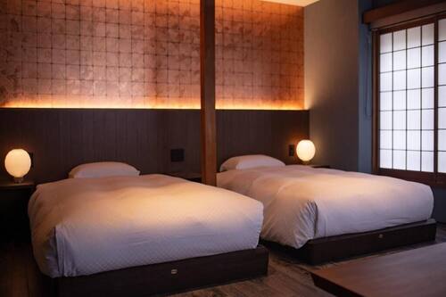 Chambre triple exécutive | Coffre-fort, accès au Wi-Fi (inclus)
