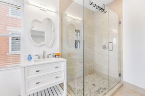Hair dryer, towels, soap, shampoo